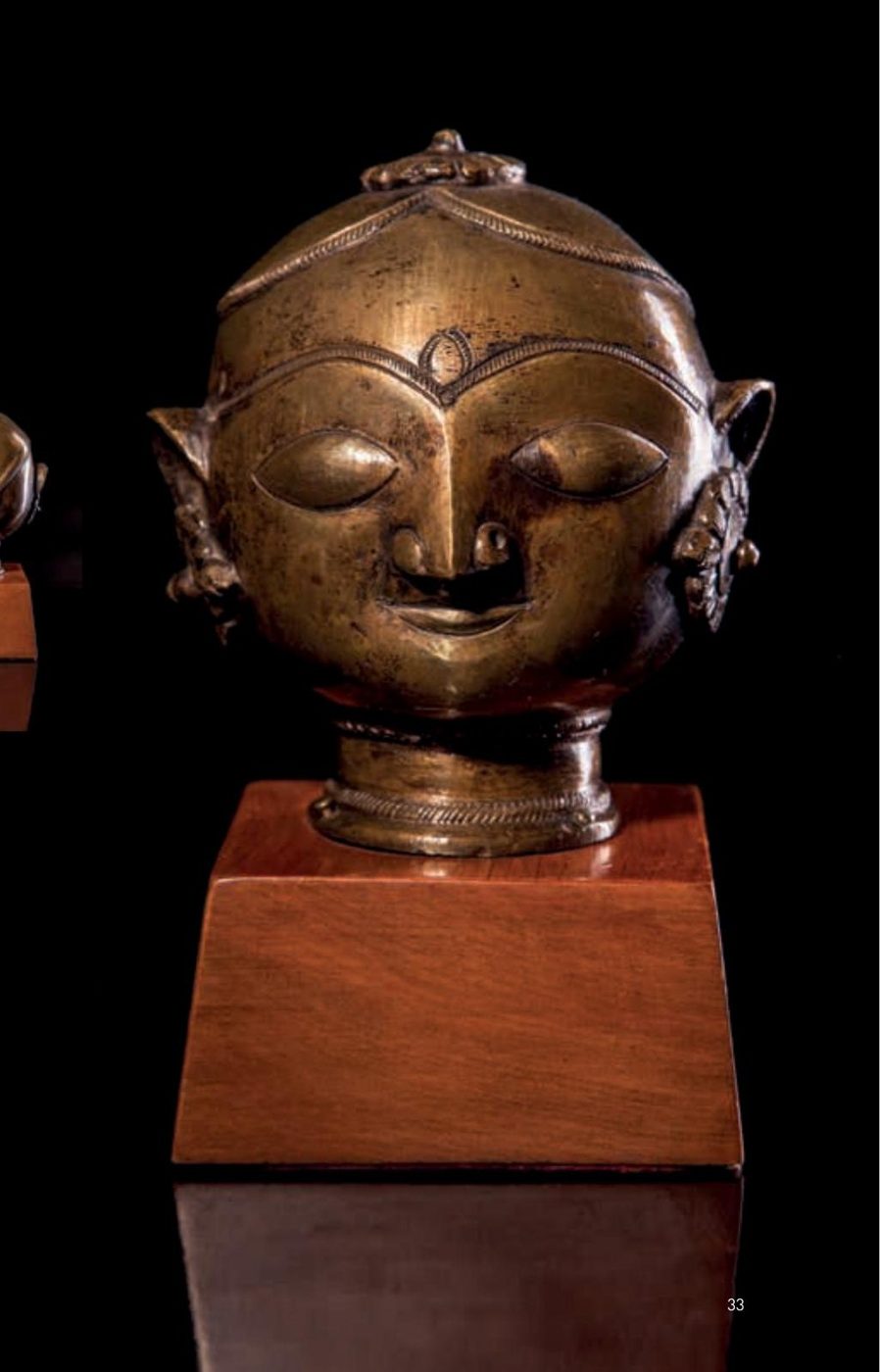 Bronze Head with Flowerhead Topknot — Unknown